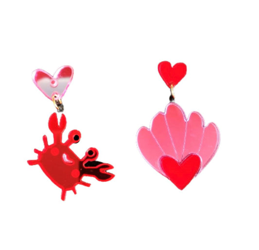 Cangrejo y almeja rosa roja
